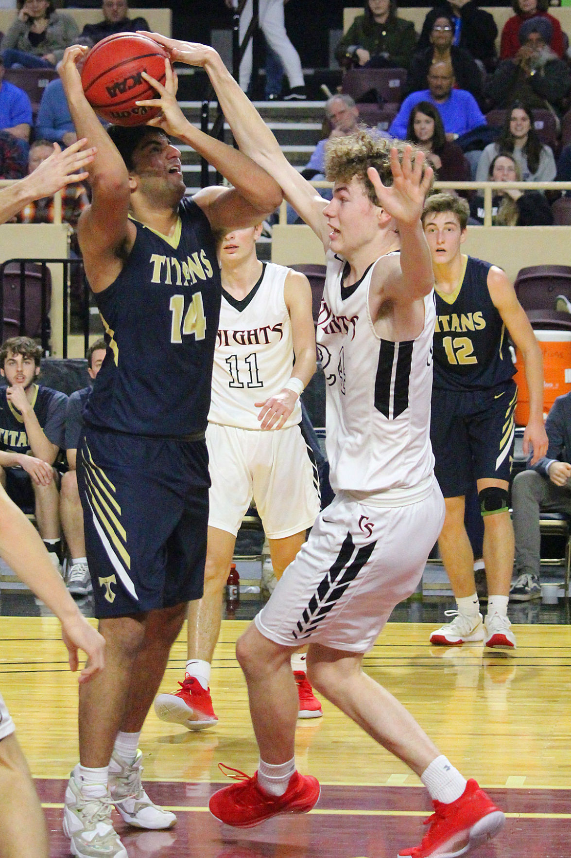 HV14 Manu Singh has a shot defended by CS24 Parker Huffman.jpg